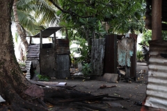 Local outhouse and shower in Gales Point. Photo: Hannah Ratcliff